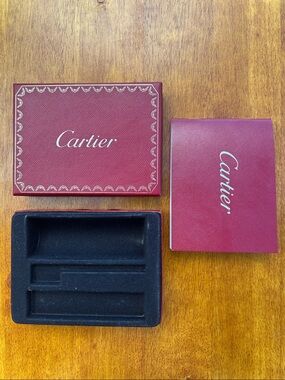 Empty Cartier jewelry & watch cleaning kit box with booklet